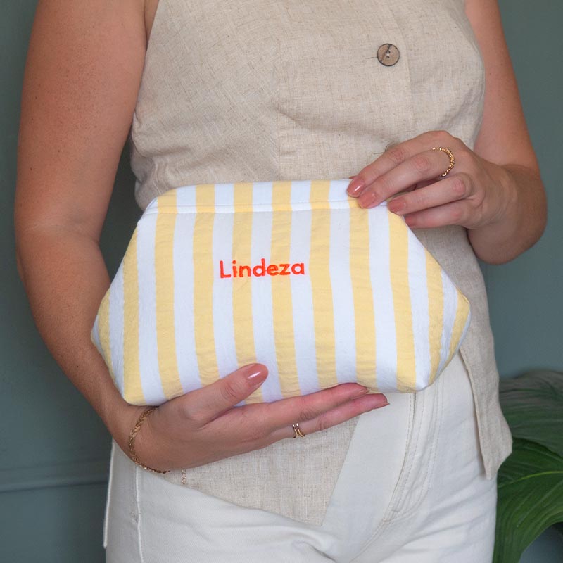 LINDEZA-NECESER-DE-MANO-BOLSO-DE-MANO-DENIA-RAYAS